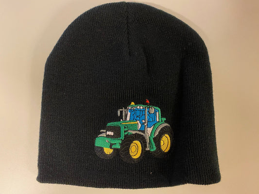 Hue med grøn traktor