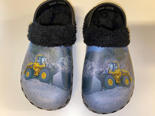 Træsko i plast - Gul gummiged i stengrav med for