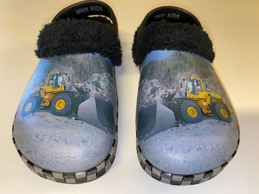 Træsko i plast - Gul gummiged i stengrav med for