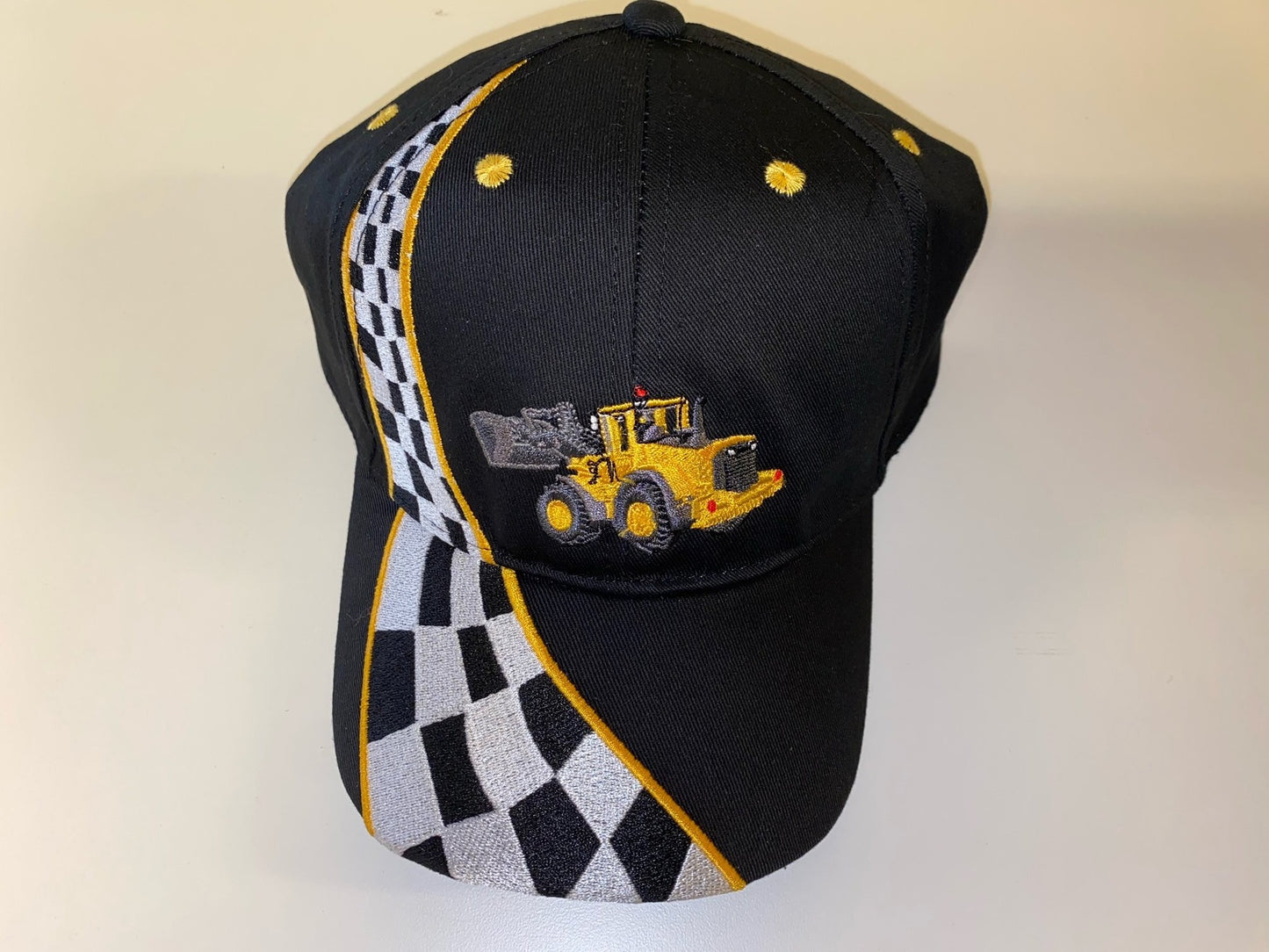 Kasket med gul rendegraver