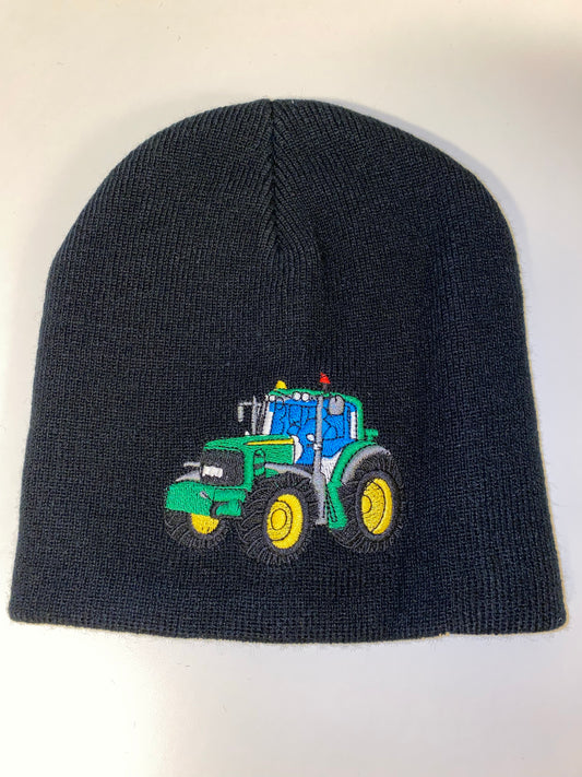 Hue med grøn traktor